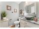 Chic powder room with granite countertop, vessel sink, and stylish decor at 9441 Southern Hills Cir, Lone Tree, CO 80124