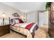 Well-lit bedroom with comfortable bed and closet at 9441 Southern Hills Cir, Lone Tree, CO 80124
