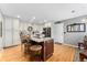 Kitchen island with granite countertops and seating at 9441 Southern Hills Cir, Lone Tree, CO 80124