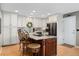 Kitchen island with granite countertops and seating at 9441 Southern Hills Cir, Lone Tree, CO 80124