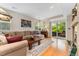 Comfortable living room with a cozy couch and access to the backyard at 9441 Southern Hills Cir, Lone Tree, CO 80124