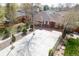 An overhead view of the home showcasing its large driveway and mature landscaping at 3021 Grape St, Denver, CO 80207