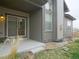 Back patio with glass sliding doors at 11860 Sandcastle Ct, Parker, CO 80138