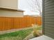 Wood fence providing privacy in the backyard space at 11860 Sandcastle Ct, Parker, CO 80138