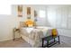Bedroom with a plush bed, soft carpeting, and bright natural lighting at 11860 Sandcastle Ct, Parker, CO 80138