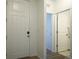 Entryway with coat closet and access to the home's bathroom at 11860 Sandcastle Ct, Parker, CO 80138