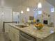 Open concept kitchen with granite countertops, stainless appliances, and a modern aesthetic at 11860 Sandcastle Ct, Parker, CO 80138