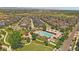Picturesque aerial view of the community, showcasing the pool, park, and well-maintained surroundings at 5663 W 96Th Ave, Westminster, CO 80020