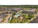 Beautiful aerial view of the neighborhood featuring a pool, park, and lush landscaping at 5663 W 96Th Ave, Westminster, CO 80020