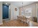 Charming dining room with wainscotting, a chandelier, and natural light at 5663 W 96Th Ave, Westminster, CO 80020