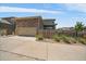Two-story home showcasing the 2-car garage and fenced backyard at 5663 W 96Th Ave, Westminster, CO 80020
