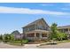 Charming two-story home with a covered front porch and manicured landscaping at 5663 W 96Th Ave, Westminster, CO 80020