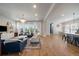 Spacious living room with an open floor plan, large windows, and stylish furnishings at 5663 W 96Th Ave, Westminster, CO 80020