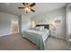 Bright main bedroom with ceiling fan and ensuite bathroom at 5663 W 96Th Ave, Westminster, CO 80020