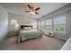Bright main bedroom with windows and ceiling fan at 5663 W 96Th Ave, Westminster, CO 80020