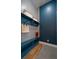 Functional mudroom featuring built-in storage shelves, bench and hooks at 5663 W 96Th Ave, Westminster, CO 80020