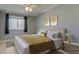 Bedroom with neutral color scheme, window, and matching bedside table at 1013 Homestake Dr # 17C, Golden, CO 80401