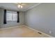Empty bedroom featuring a window and neutral-toned walls and carpet at 1013 Homestake Dr # 17C, Golden, CO 80401