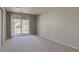 Spacious bedroom with natural light and access to the backyard at 1013 Homestake Dr # 17C, Golden, CO 80401