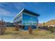 Modern building with glass facade and Colorado School of Mines logo under a clear blue sky at 1013 Homestake Dr # 17C, Golden, CO 80401