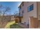 Back of home with a deck overlooking a grassy yard at 1013 Homestake Dr # 17C, Golden, CO 80401