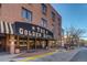 Exterior view of the Golden Hotel entrance, featuring a classic awning and brick facade at 1013 Homestake Dr # 17C, Golden, CO 80401