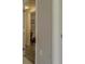 Open hallway with views into other rooms of the home at 1013 Homestake Dr # 17C, Golden, CO 80401