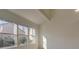 Bright living room featuring vaulted ceilings and large windows at 1013 Homestake Dr # 17C, Golden, CO 80401