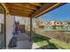 Under deck space with a patio and lawn with view of other homes at 1013 Homestake Dr # 17C, Golden, CO 80401