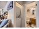 Bathroom with a stackable washer and dryer, and a vanity with a sink at 3600 S Pierce St # 106, Lakewood, CO 80235