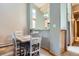 Bright dining area with seating for four and pass through to the kitchen at 180 Broken Lance Dr # 14, Breckenridge, CO 80424