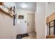 Inviting entryway featuring a rustic wood accent and a decorative front door with complementary decor at 180 Broken Lance Dr # 14, Breckenridge, CO 80424