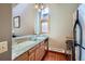 Kitchen features granite countertops, stainless steel appliances, and wood flooring, with natural light from a window at 180 Broken Lance Dr # 14, Breckenridge, CO 80424