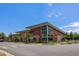 Corner view of a building featuring a modern design and large windows at 4076 Andes Way, Denver, CO 80249