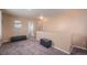 Spacious loft with neutral carpet and ample natural light at 4076 Andes Way, Denver, CO 80249
