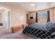 Inviting main bedroom featuring a large window and ample closet space at 4076 Andes Way, Denver, CO 80249
