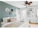 Inviting bedroom features stylish decor, a ceiling fan, and a comfortable bed at 3005 Grove St, Denver, CO 80211