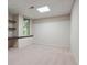 Bedroom with window, desk, and shelves for optimal light and storage at 1129 Genesee Vista Rd, Golden, CO 80401