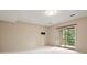 Spacious room with sliding doors to deck and wall mount for a TV at 1129 Genesee Vista Rd, Golden, CO 80401