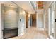 Open foyer with hardwood floors, stairs, and contemporary design elements at 1129 Genesee Vista Rd, Golden, CO 80401