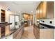 Modern kitchen with a center island, stainless steel appliances and granite countertops at 1129 Genesee Vista Rd, Golden, CO 80401