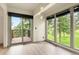 Bright living room with large windows offering scenic outdoor views at 1129 Genesee Vista Rd, Golden, CO 80401