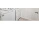 Bright laundry area with machines at 27684 E Byers Ave, Aurora, CO 80018