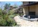 Paver stone patio and walkways in the backyard with mature landscaping and trees at 8095 E Lehigh Ave, Denver, CO 80237