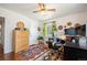 Home office with an area rug, desk, and natural light at 2084 Bell Ct, Lakewood, CO 80215
