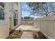 Private back patio with white fence and garden space ready for a personal touch at 2960 S Parker Ct, Aurora, CO 80014