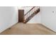 Spacious empty room with a staircase, offering a blank canvas for customization and personalization at 2960 S Parker Ct, Aurora, CO 80014