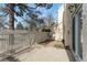 Concrete patio featuring a partial fence and an attached home at 2960 S Parker Ct, Aurora, CO 80014
