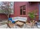 Inviting outdoor patio with comfortable seating, perfect for relaxing and entertaining at 23646 Genesee Village Rd, Golden, CO 80401