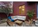 Inviting outdoor patio with comfortable seating, perfect for relaxing and entertaining at 23646 Genesee Village Rd, Golden, CO 80401